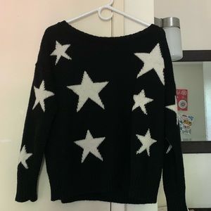 Black sweater with white stars